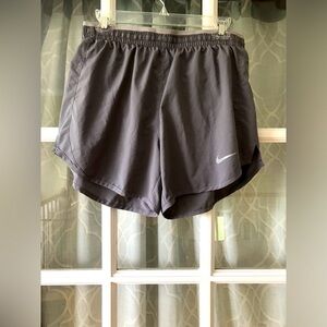 Nike size M dri-fit running shorts with built in undie-cover excellent condition